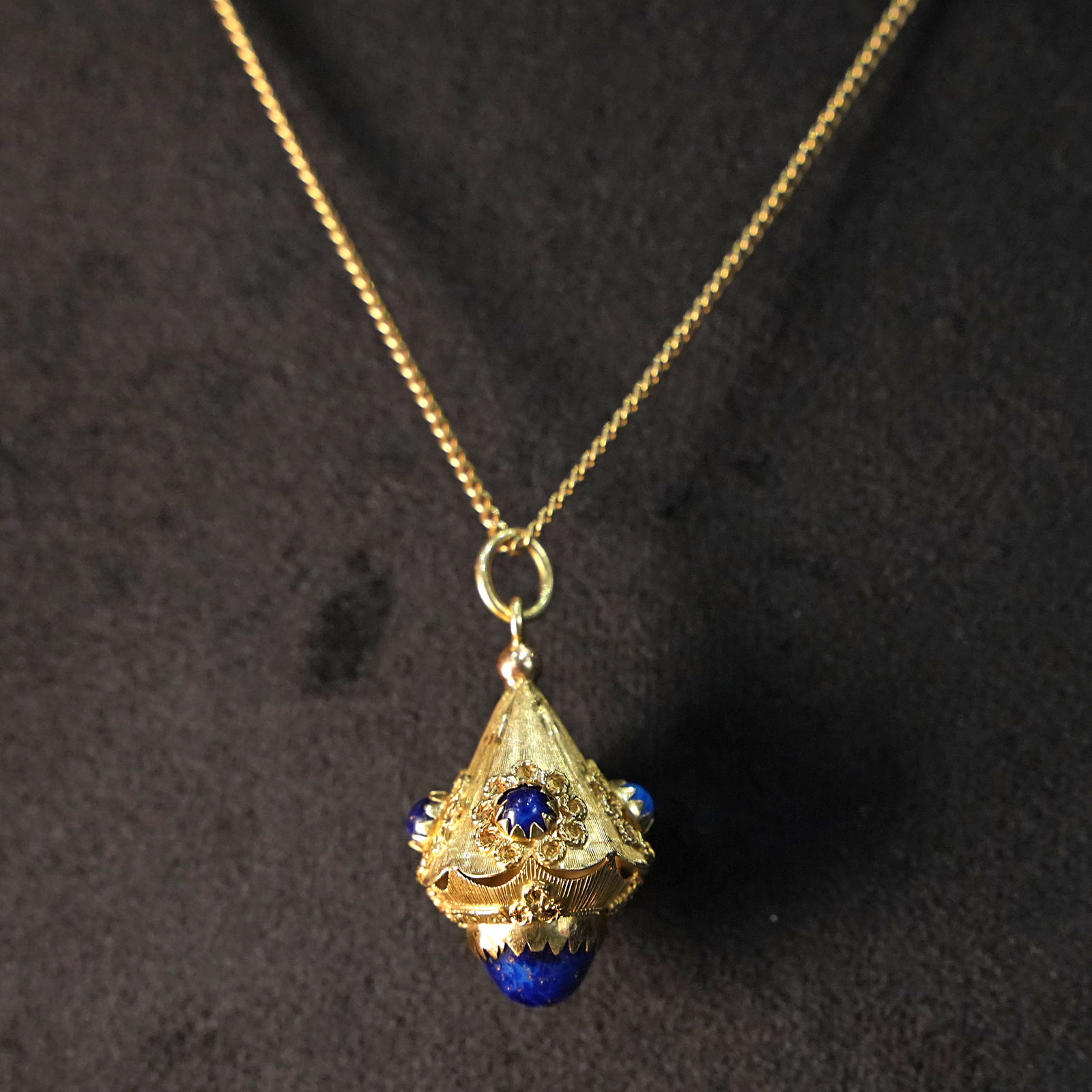Exquisite 18kt Yellow Gold and Lapis Lazuli Oriental Dome Pendant inspired with Intricate Detailing,: Exquisite 18kt yellow gold and lapis lazuli pendant designed in an oriental dome or temple shape, featuring dense engraved patterns and fine micro-granulation that highlight its exotic charm and maste