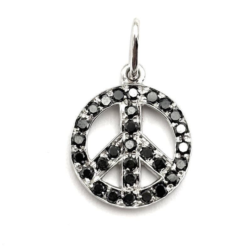 Peace pendant, black diamonds and white gold; 2.59 gr.: Contemporary pendant for this Peace symbol pendant in 18 kt white gold, with black diamonds. Emblematic, powerful and precious! Our company's certification is available for free, upon request. If you