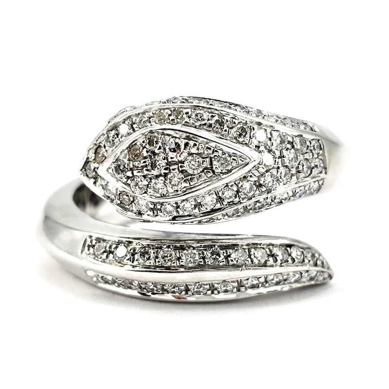 Contrarie diamond snake ring, solid white gold - 1.30-1.50 ct; 14.43 gr: Stunning solid white gold, diamond-studded contrarie snake ring. Snake sparkling, bewitching and ultra precious! Our company's certification is available for free, upon request. If you wish to