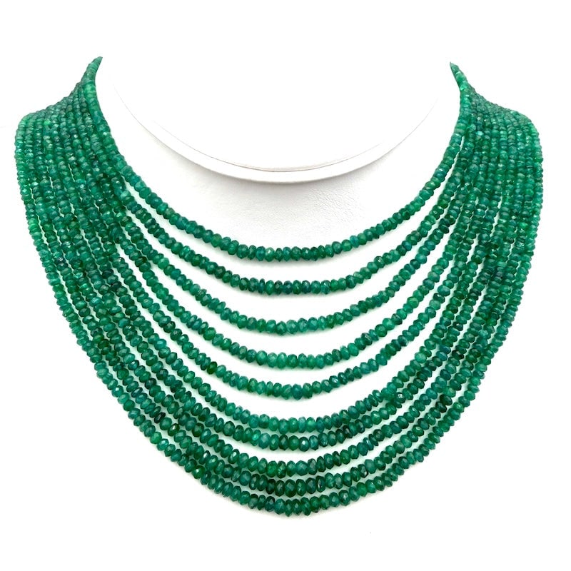 Necklace 10 strands emeralds and white gold - 82 gr; 39 cm: Masterpiece necklace with 10 strands of emeralds, faceted rondelles 39 cm in length the shortest inner strand. Mounted with maxi box clasp, satin-finished and engraved, in 18 kt white gold. Very Occas