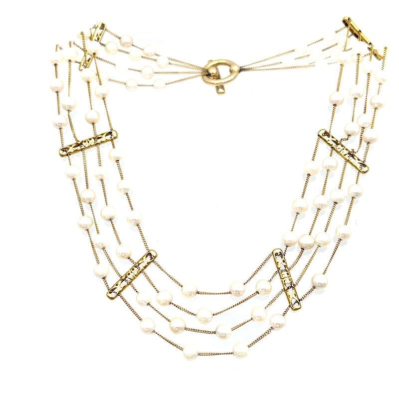 Yellow gold alternating chain multi-strand pearl necklace; 38 gr - 37 cm: Stunning multi-strand necklace of Japanese Akoya pearls, alternating chain with adorable vintage openwork bars, in 18 kt yellow gold. Sophisticated scenic occasion, precious, unusual and with convenie
