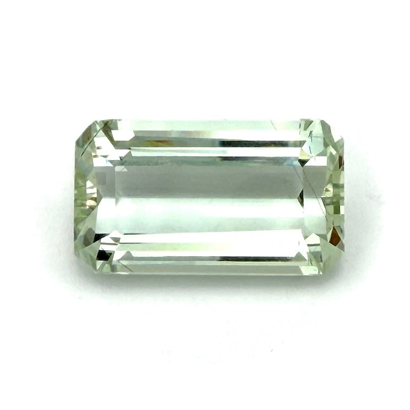 Green maxi aquamarine, loose stone, rectangular - 26.86 ct.: Vivid green aquamarine loose gemstone showcasing a bold rectangular silhouette with a refined fancy faceted finish. Its generous proportions and crisp edges highlight its natural clarity and luminous 