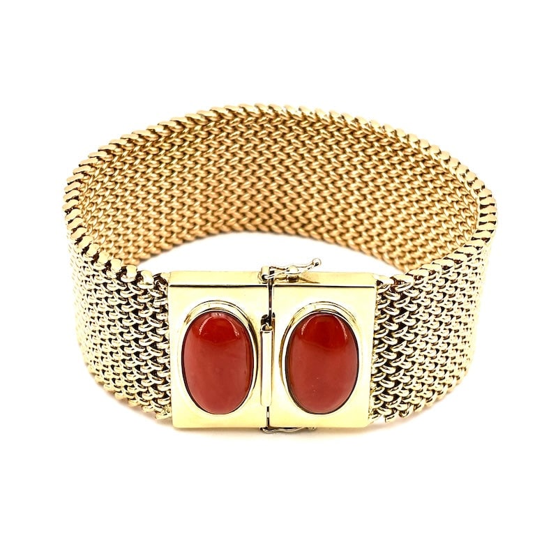80s maxi cuff bracelet, yellow gold and coral cabochon; 90 gr - 22 cm: A magnificent and majestic vintage maxi cuff bracelet all in 18 kt yellow gold, with masterfully crafted modern woven motif! An extraordinary and grand 80's wide band bracelet with double cabochons of