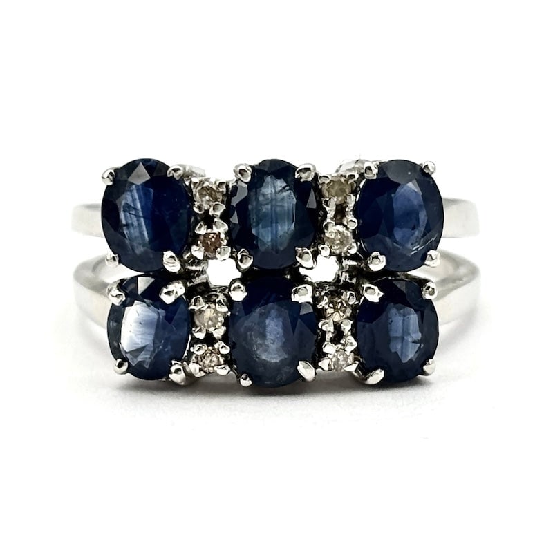 Double trilogy ring sapphires and diamonds; 4.75 gr.: Beautiful double trilogy ring in 18k white gold with sapphires and diamonds. A must-have in a blue variant that doubles for maximum yield, at a never-seen-before price! Our company's certification is 