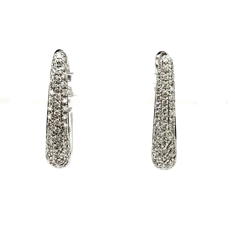 Brilliant rings and gold earrings - 0.36 ct - and gold; 3.12 gr.: Universal and precious crescent hoop earrings in white gold and diamonds. Interlocking pin. A passe partout of white jewel of brilliants, convenient and indispensable! Our company's certification is a