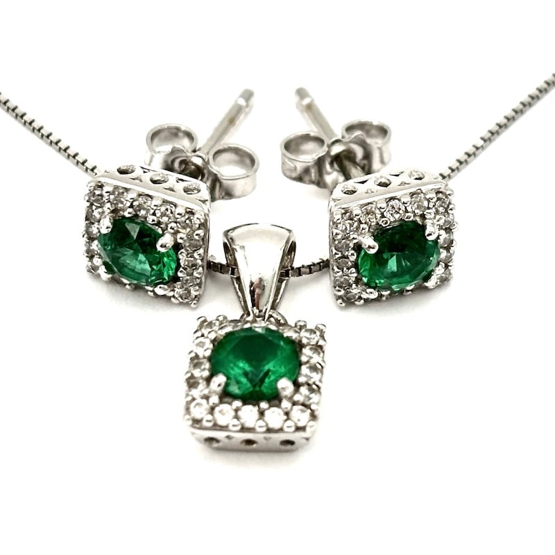 Parure pendant and earrings synthetic emeralds, cubic zirconia and 18Kt white gold; 3.97 g: Young and versatile 18 kt white gold parure, consisting of chain and pendant and lobe earrings, of synthetic emeralds and cubic zirconia. Easy to wear affordable! Our company's certification is availa