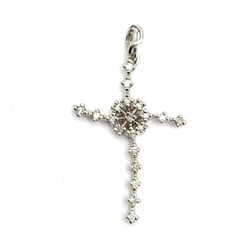 Cross pendant white gold and diamonds 0.20-25 ct; 1.77 gr: Fine and distinctive cross pendant, in 18 kt white gold and rhinestones, with soft, light and asymmetrical lines. Feminine and highly accessible. Our company's certification is available for free, upo