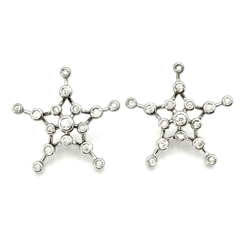 Star, diamond and white gold earrings; 0.70-0.75 ct; gr 6.66: Spectacular large star lobe earrings in white gold with diamonds. Back with stud and butterfly back. Precious and contemporary design for a truly stellar piece of jewelry offered at a price to die for
