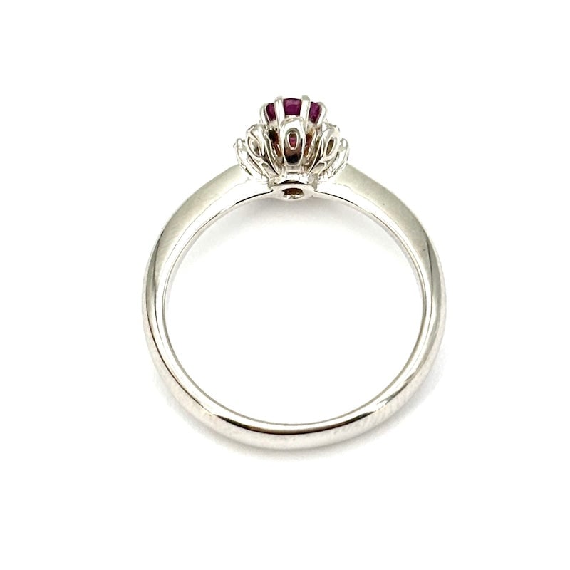 Circular ruby and diamond flower ring ; 3.68 gr. - 6
