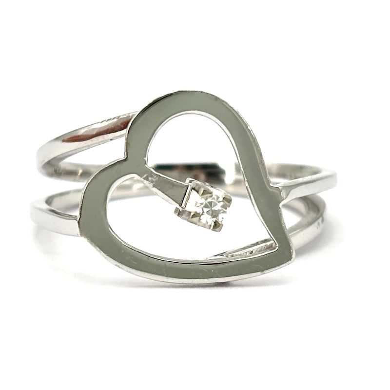 Heart ring design, brilliant and white gold; 3.25 gr.: Young, minimal, super glamorous design! 18 kt white gold ring, with heart and central brilliant, for a super fashionable jewel delight! Our company's certification is available for free, upon request.