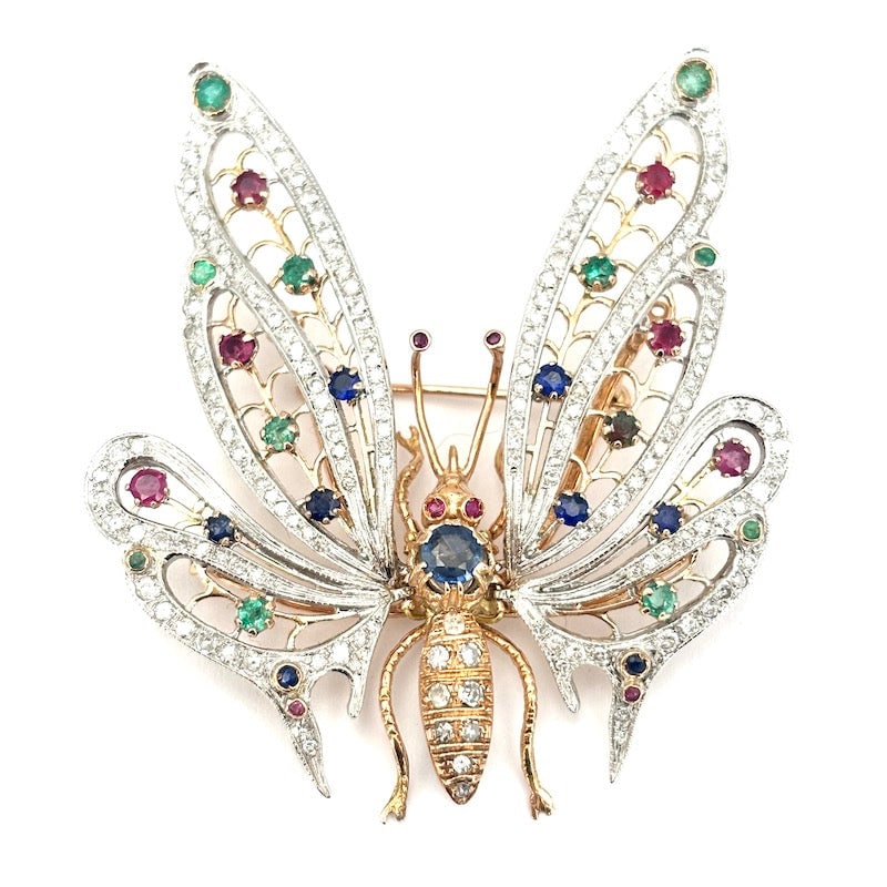 Butterfly masterpiece brooch, brilliants, natural gems and gold; 24.14 gr.: Masterful and very precious maxi butterfly brooch, exquisitely crafted in 12 kt yellow and white gold, with multicolor natural gemstones (rubies, sapphires and emeralds) and diamonds. A sophisticated,
