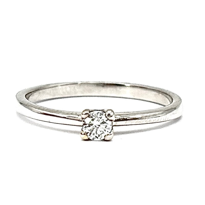 Solitaire brilliant ring 0.15 ct and white gold; 2.32 gr: A very classic and fine 0.15 ct solitaire engagement ring. Classic white, immortal, universal and eternal! A timeless and exquisite ring, suitable for every woman in the world! Our company's certifica