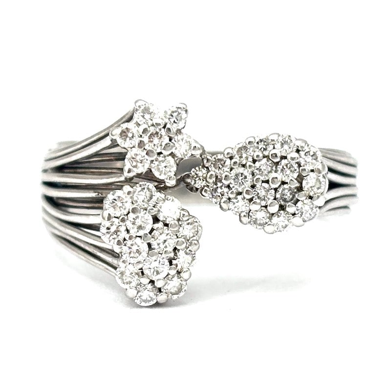 Contrarie flower, heart and diamond drop ring, white gold - 0.70-0.80 ct; 5.8 g: White gold multi-strand contrarie ring, with flower, heart and drop studded with brilliants. Multifaceted, sparkling, sleek and contemporary design! Our company's certification is available for free, 