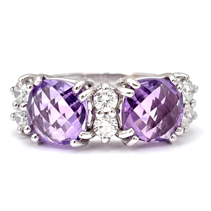 Gold, amethyst and diamond ring; 6.84 gr.: Unusually special textural combination, cuts and pattern for this absolutely like-new contemporary ring in 18 kt white gold with beautiful faceted amethysts and diamonds. A super feminine,