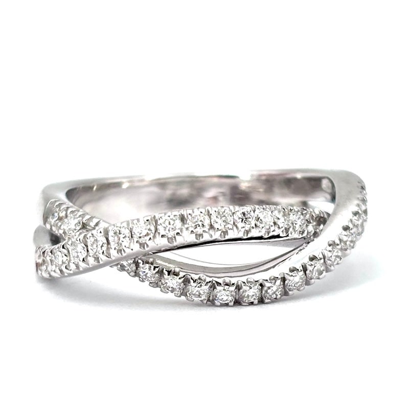 Brilliant band ring, white gold; 0.70-0.80 ct total- 6.88 gr: Beautiful, universal and versatile double diamond serpentine band ring in 18 kt white gold. Soft, essential and very bright design. An exclusive, comfortable and most precious white jewelry! Our