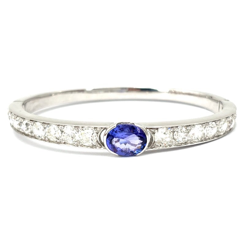 Diamond and tanzanite masterpiece rigid bracelet, white gold - 23.65 gr.: Magnificent 18 kt white gold rigid hoop masterpiece bracelet, mounting no less than 5.46 ct total of gorgeous antique-cut diamonds and a sublime central oval-cut tanzanite. Side opening with 8