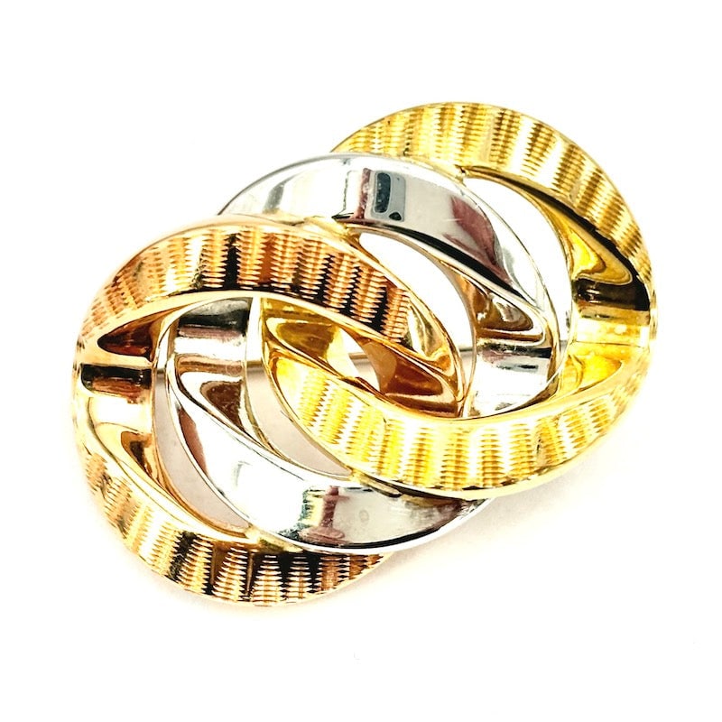 Three-color gold brooch; 5.35 gr.: Refined brooch with refined three intersecting circles frame in yellow, white and rose gold. A versatile touch of total gold style! Our company's certification is available for free, upon request. If 
