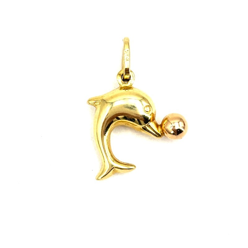 18 kt yellow and rose gold dolphin charm pendant; 1.27 gm: Adorable dolphin charm all in 18 kt yellow gold with the ball on the snout in 18 kt rose gold! A little gem of goldsmithing that makes the beloved dolphin prototype, a real gem charm! Our company's ce