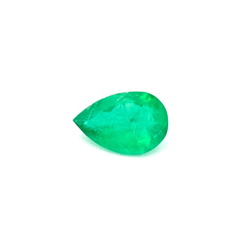 Emerald loose stone, drop - 1.21 ct: A loose emerald gemstone shaped in a pear faceted cut, displaying a deep vivid green tone with elegant light reflection and refined transparency, ideal for sophisticated custom jewelry creations. Meas