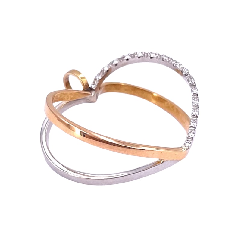 Rose and white gold heart pendant with diamonds; 4.5 gr.: Romantically light and contemporary design for this two-tone heart pendant in 18 kt rose and white gold with diamonds. The pendant measures 2.90 cm x 2.70 cm. Precious, refined and bright symbol of et