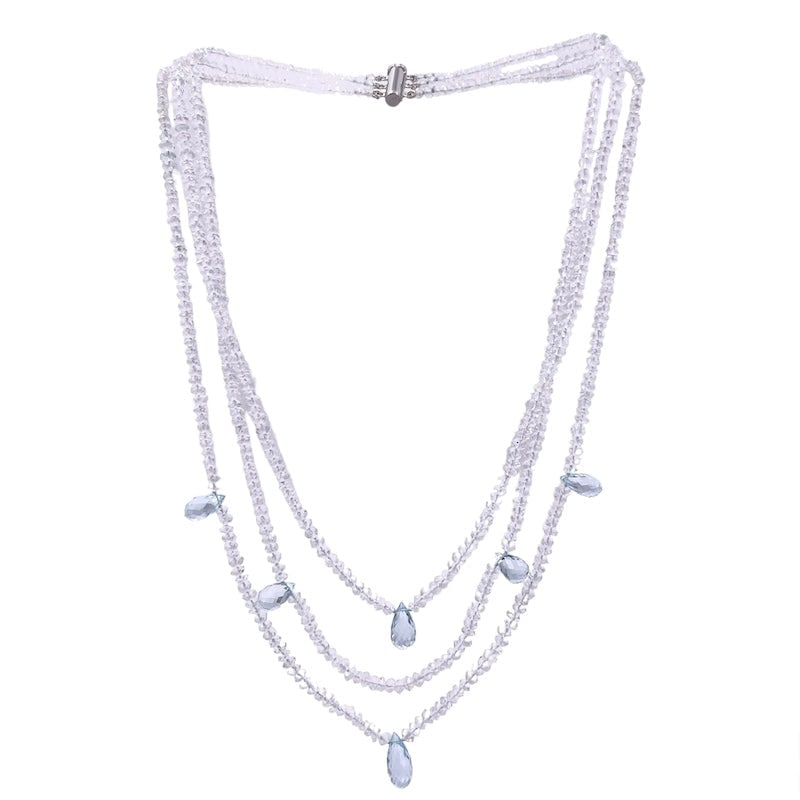 Three-strand necklace, rock crystal, aquamarine and gold drops, fabulous - 44 cm; 36.23 gr.: Stunning occasion for this necklace with brioleted drops of aquamarine and 3 scaled strands of rock crystals, faceted rondelle cut with a diameter of 4 mm, with 18 kt white gold bayonet clasp. For the