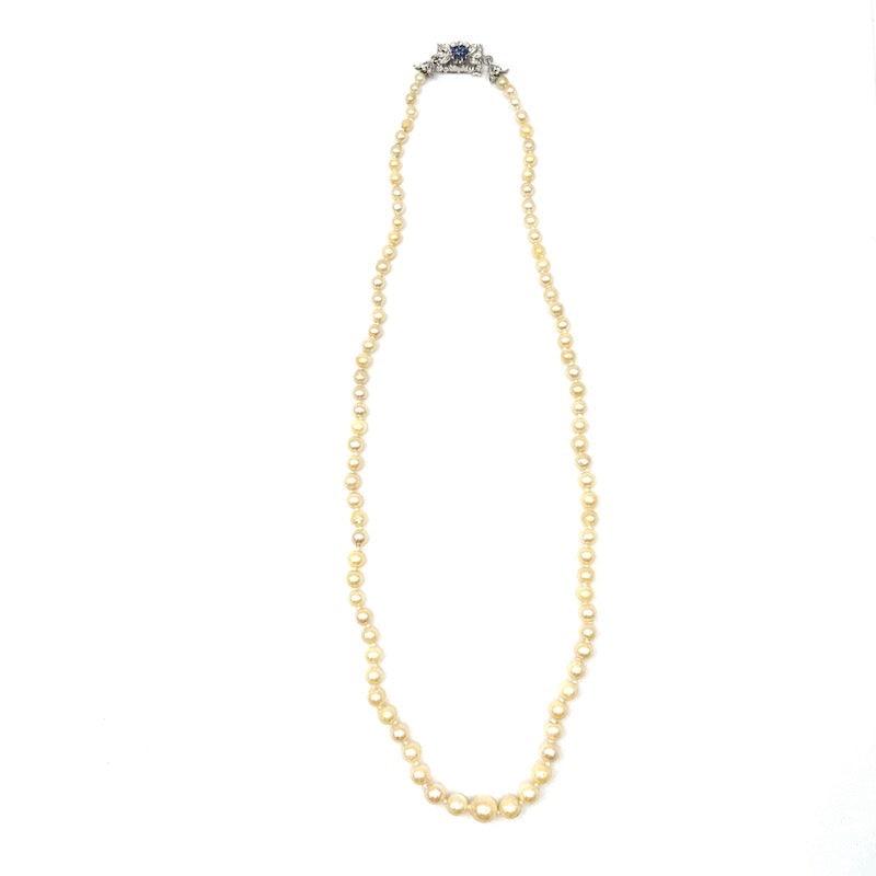 Scaled beaded necklace, white gold style clasp and sapphires; 48 cm: An exquisite scaled imperfect Japanese pearl necklace with beautiful 18 kt white gold style clasp with sapphire flower. Delightful vintage pearl jewelry below cost! Our company's certification is avai