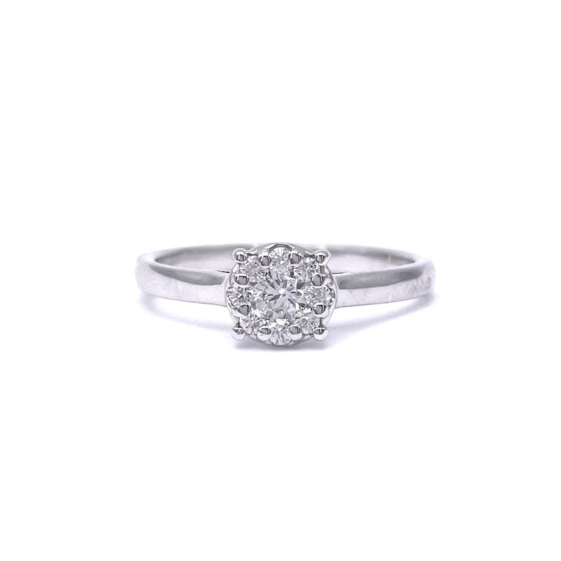 Circular daisy and gold brilliants ring - 0.28 ct; 2.76 gr.: Stunning classic ring with central circular daisy, all made of 18-karat white gold. The ring mounts a total of 0.28 ct of total brilliant-cut diamonds of F color, VS clarity, including 0.15 ct the cen