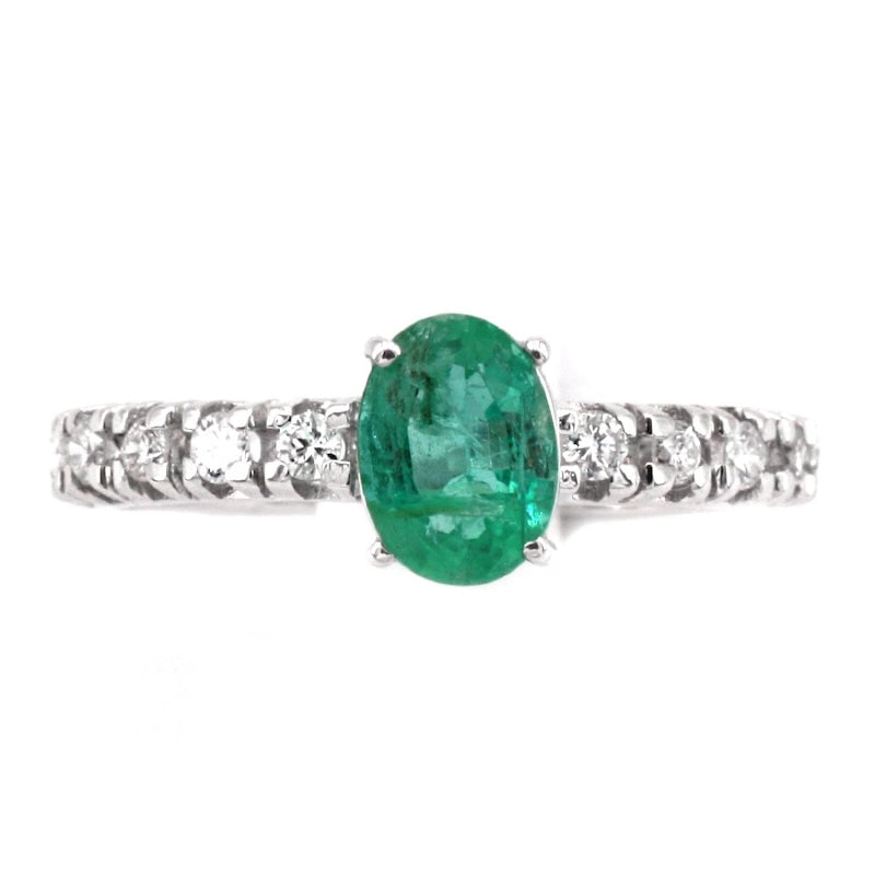 Semi eternel gold, diamond and emerald solitaire ring; 2.04 gr.: A brilliants veretta ring with center color stone, valuable and universal! Semi eternelle ring in 18k white gold with brilliant-cut diamonds of color G and VS clarity - 0.40 ct - and oval-cut solitair