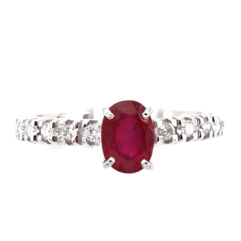 Semi eternel gold, diamond and ruby solitaire ring; 2.2 gr.: A brilliants veretta ring with center color stone, valuable and universal! Semi-eternelle ring in 18 kt white gold with brilliant-cut diamonds of color G and VS clarity - 0.50 ct - and oval-cut solita
