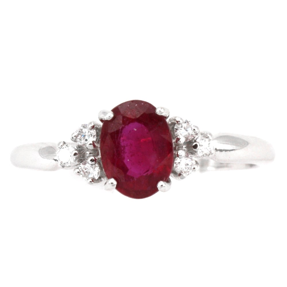 Ruby and diamond triptych ring in gold; 2.07 gr.: Graceful and elegant ring with central ruby solitaire and side diamond triptychs, offered at outlet price! Our company's certification is available for free, upon request. If you wish to receive any o