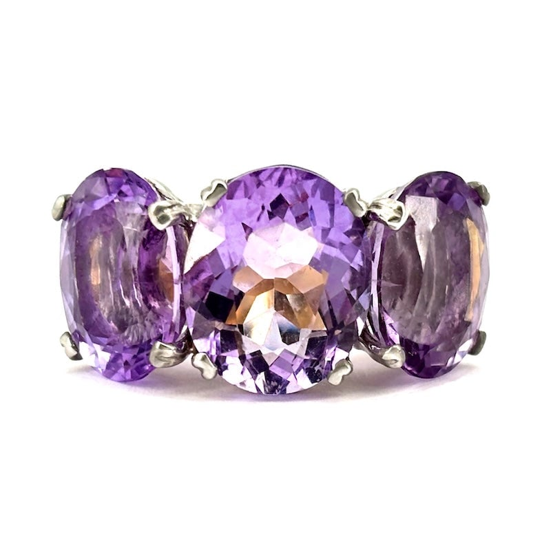 Maxi trilogy amethyst ring, gold; 12.69 g: Mammoth dimensions for this fabulous trilogy ring in 18kt yellow and white gold with maxi faceted oval amethysts. Intensely feminine color and bold character! Our company's certification is available 