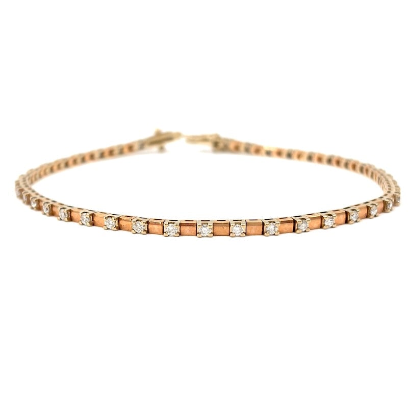 Diamond and rose gold tennis bracelet - 1.02 ct; 8.5 g: Bargain!!! Fabulous tennis bracelet with over 1 ct of alternating diamonds in a turned setting in 18 kt rose gold. Double eight safety clasp. A precious, unusual, and super-captivating variation on th