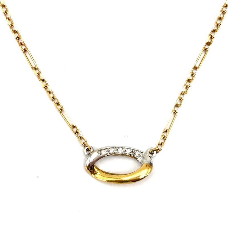Yellow gold necklace with two-tone twisted oval insert and diamonds; 5.79 g: 18 kt yellow gold necklace with a central insert in a slightly twisted two-tone oval design with diamonds. A universal, luminous, and beautiful all-purpose piece!!! Our company's certification is avai