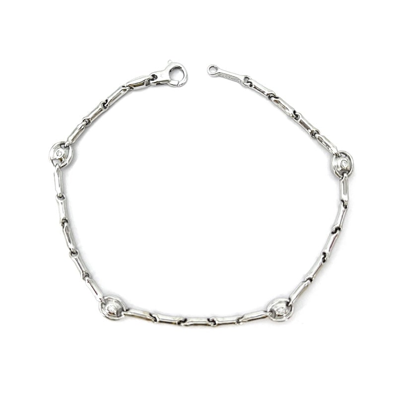 Chimento diamond and white gold bar bracelet - 0.04-0.05 ct; 6.47 g - 19.5 cm: Exquisite pre-owned Chimento bracelet, refurbished to new condition, in 18kt white gold, featuring 0.04-0.05 ct of total diamonds set in a onion shape, further framed in white gold, alternating with b