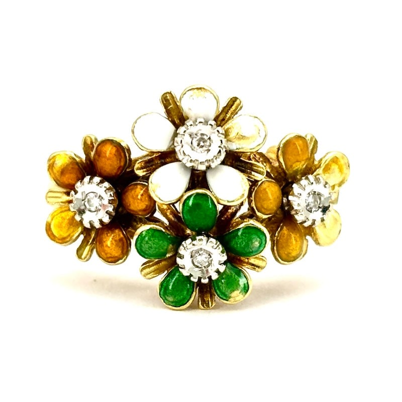 Vintage bouquet ring, enamel and diamonds; 4.55 g: With a romantic and feminine aura, this ring is a small vintage bouquet of four flowers, with central diamonds. The enamels have small color losses marked by time, bu