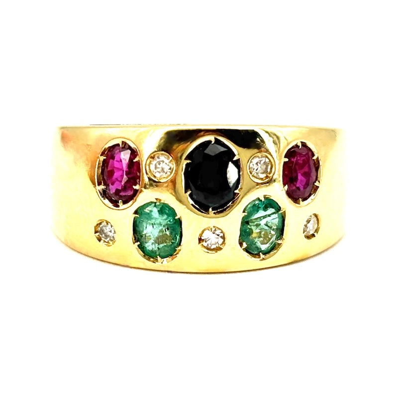 Multicolor band ring, yellow gold; 6.19 gr: Splendid multicolor band ring in 18 kt yellow gold, with rubies, sapphires, emeralds and diamonds set at night, for a smooth and mirrored effect top. Colorful, comfortable and precious! Our company's 