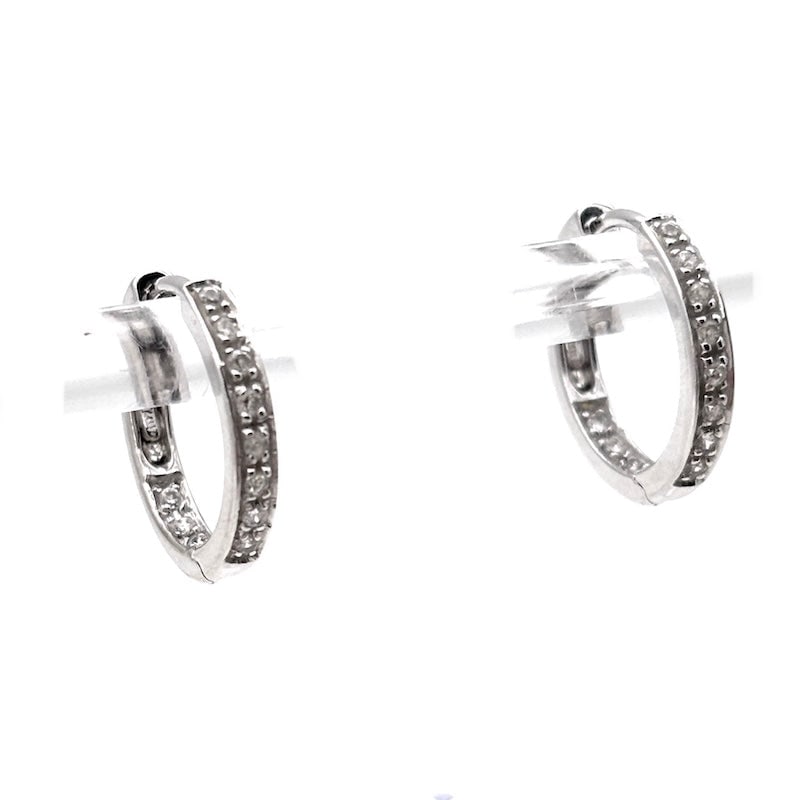 Zirconia and gold ring earrings; 3.25 gr: Adorable white gold hoop earrings with zirconia riviere
