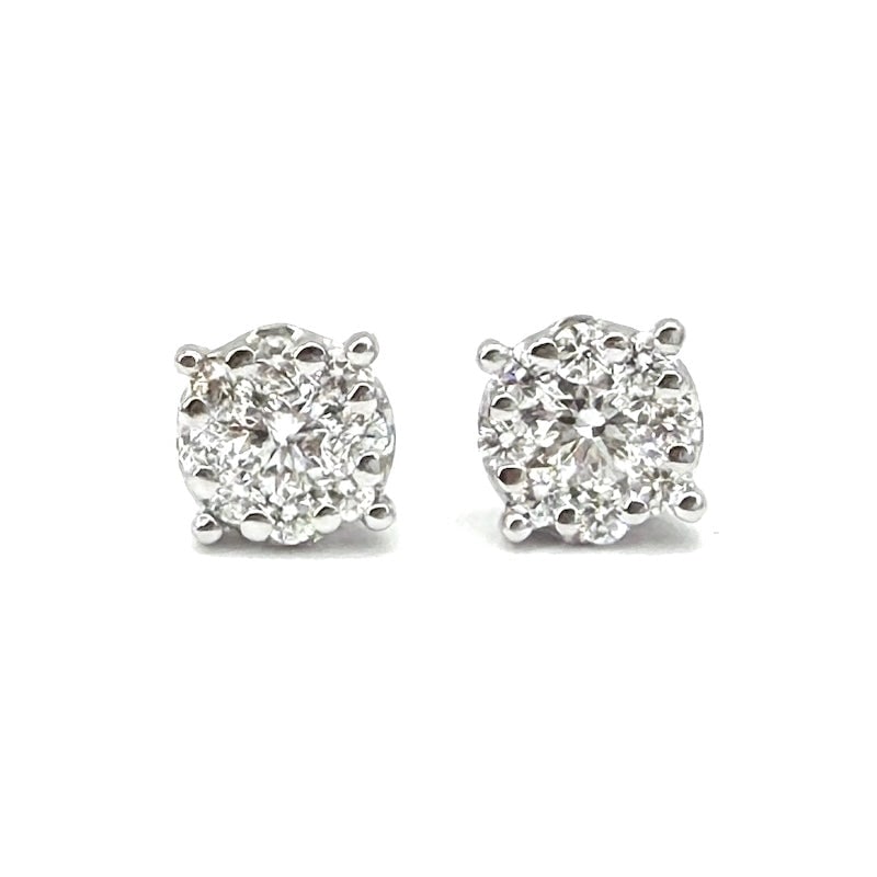 Circular daisy stud earrings in gold and diamonds - 0.85 ct; 2.48 g: Magnificent circular daisy stud earrings in 18kt white gold with 0.85 ct of total brilliant-cut diamonds, F color, VS clarity. Back with post and butterfly. A guarantee of sparkle, dimensional importa