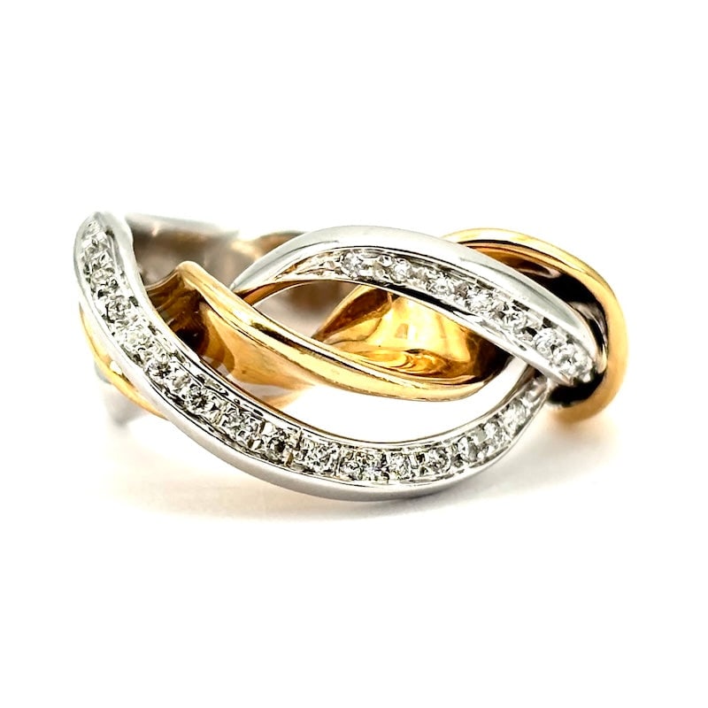 Two-tone gold twisted band ring with diamonds; 9.85 g: Beautiful, solid twisted band ring in 18kt rose and white gold, with a double central diamond track, for a designer ring as beautiful as it is comfortable and precious!! Our company's certificati