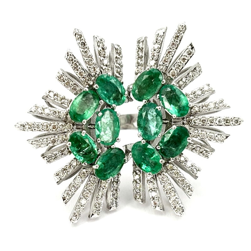 Maxi flower ring with emeralds and brilliant rays, white gold, 16.64 g: A stunning green and white dream, majestic and ultra-precious! Maxi emerald flower ring in 18kt white gold with beautiful rays of white diamonds. An imposing composition that will WOWWWW!!!! Breathtak