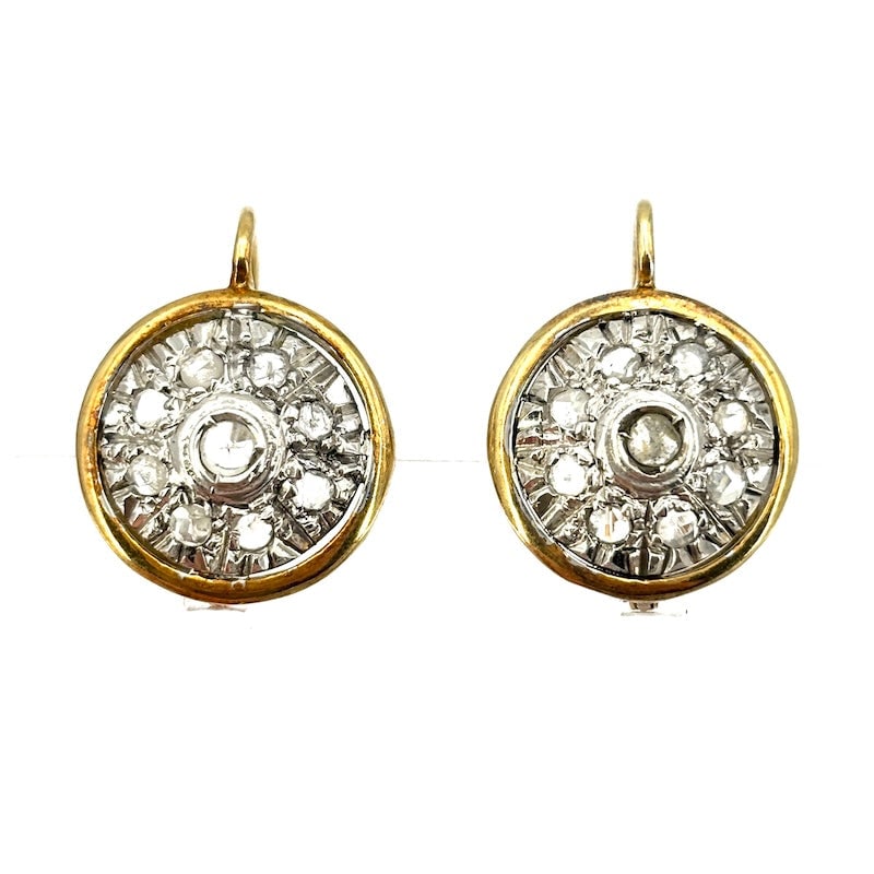 Diamond and gold circular patch earrings with closed hook; 6.56 gr: Adorable and poetic pendant earrings emblematic of the vintage style, with circular patches in style, in 18 kt gold with diamonds mounted on silver. A must-have piece of je