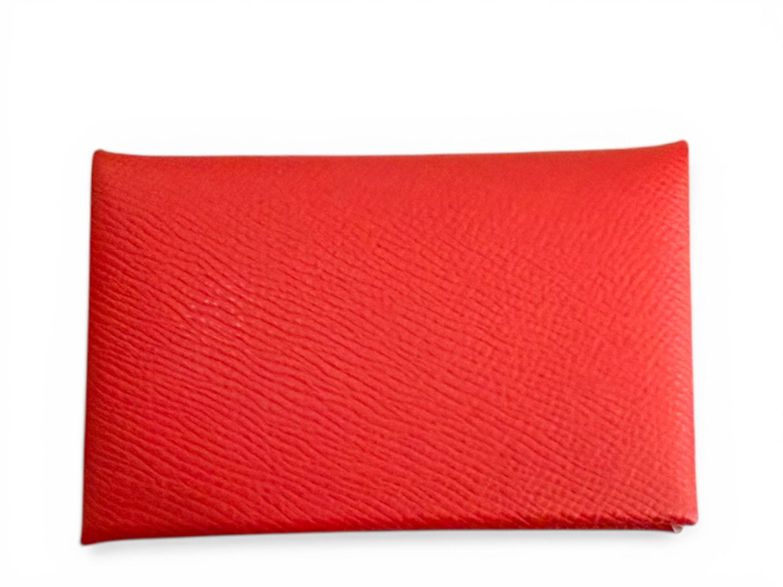 Hermes Epsom Leather Card Holder, Rubis Red, Radiant Chic Elegant Luxury Piece: A radiant and sophisticated Hermes card holder in refined Epsom leather, designed to bring bold elegance to your daily essentials. The rich Rubis red tone paired with luminous palladium accents create