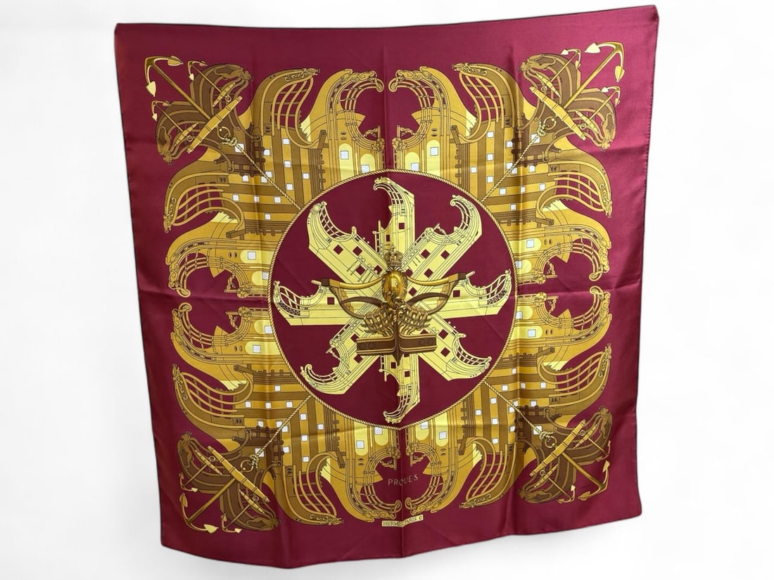 Hermes Vintage Silk Foulard Proues 1973 - Perfect Condition: Exquisite vintage Hermes foulard featuring the maritime "Proues" design from 1973. Crafted from 100% silk, this 90x90 cm carre embodies the timeless elegance and history of the Maison. In perfect cond
