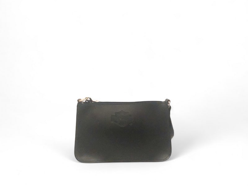 Harley Davidson Total Black Leather Handbag Chic: Stylish Harley Davidson handbag crafted from high-quality black leather for a strong, confident look. Featuring a sleek all-black design with matching hardware, this accessory captures an edgy yet sop