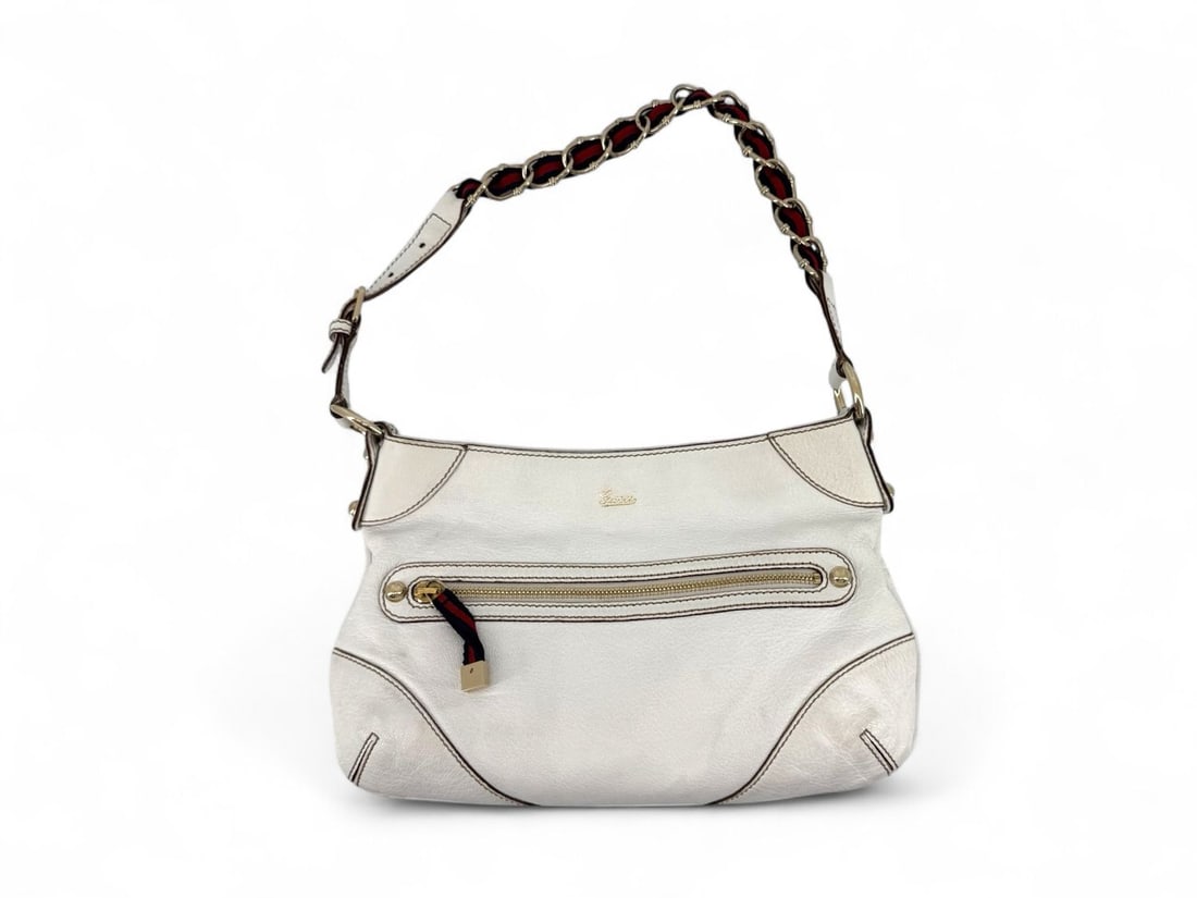 Gucci White Leather Shoulder Bag with Detail Gold Hardware - Elegant & Pristine: Magnificent Gucci shoulder bag crafted from premium white leather, featuring the iconic green and red Web detail on the strap and zipper pull. Adorned with elegant gold hardware, this piece offers a l