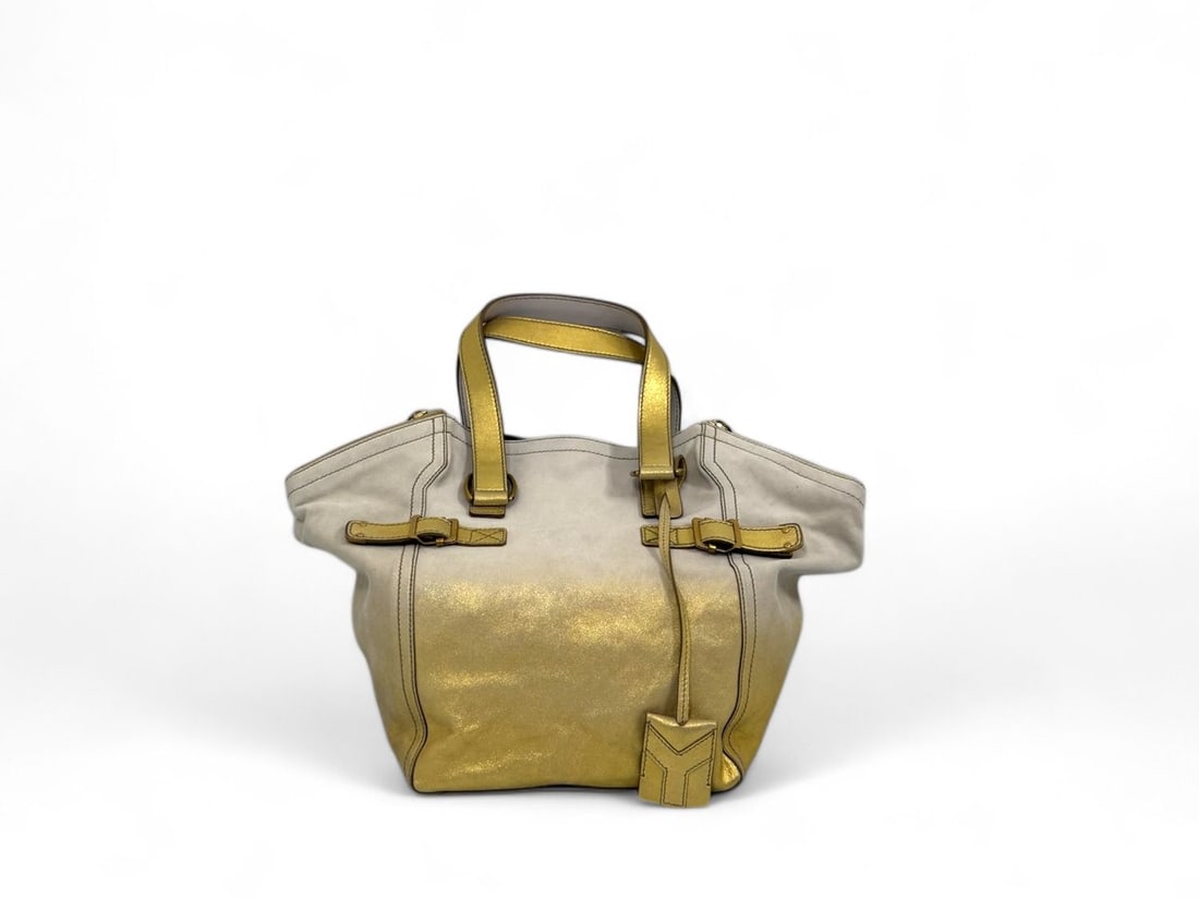 Yves Saint Laurent White & Gold Leather Shoulder Bag - Radiant & Prestigious: Magnificent Yves Saint Laurent shoulder bag crafted from soft white leather with striking gold-tone accents. The combination of gold hardware and metallic details creates a radiant and luxurious aesth