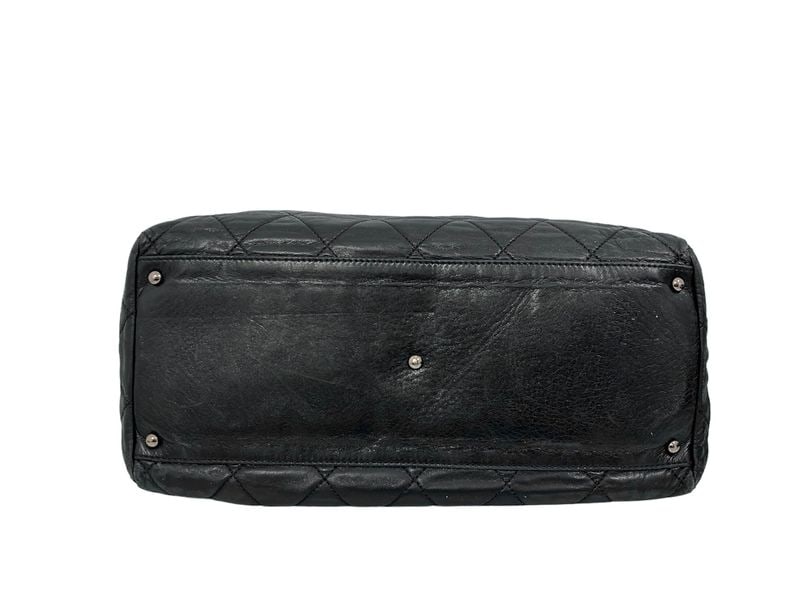 Chanel Boston Black Leather - Opulent & Absolute Masterpiece: A breathtaking Chanel Boston bag, masterfully crafted from premium black leather for an aura of absolute prestige. Featuring a structured silhouette and polished silver hardware, this piece represents