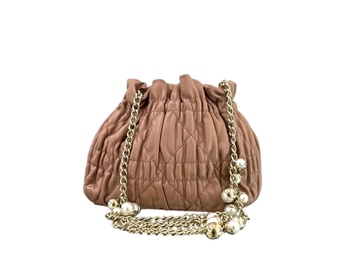 Dior Delices Antique Pink Lambskin - Exquisite & Romantic Masterpiece: The breathtaking Dior Delices, masterfully crafted from exceptionally soft lambskin in a romantic Antique Pink shade. Adorned with opulent gold hardware, its quilted design reflects the ultimate in Pa