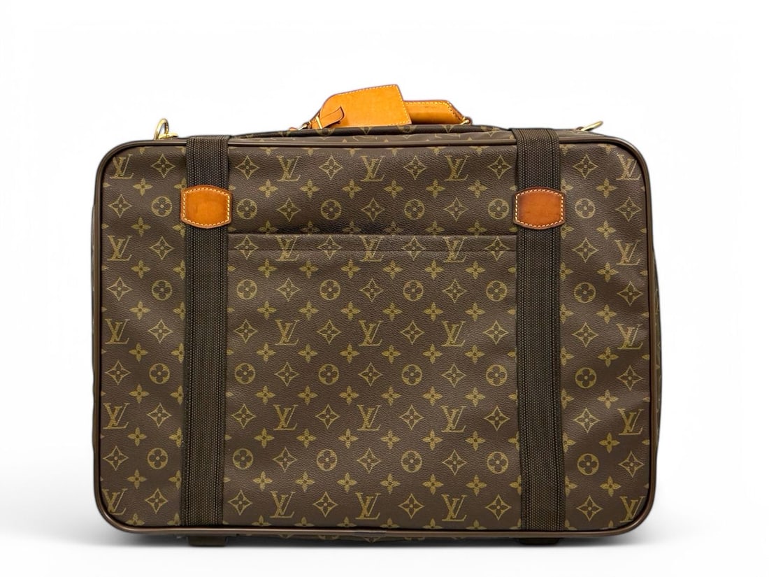 Louis Vuitton Satelite 53 Monogram - Grand & Prestigious Travel Icon: The majestic Louis Vuitton Satelite 53, a grand travel case that embodies the legendary spirit of the Maison's trunk-making heritage. Crafted in iconic Monogram canvas with robust natural cowhide deta