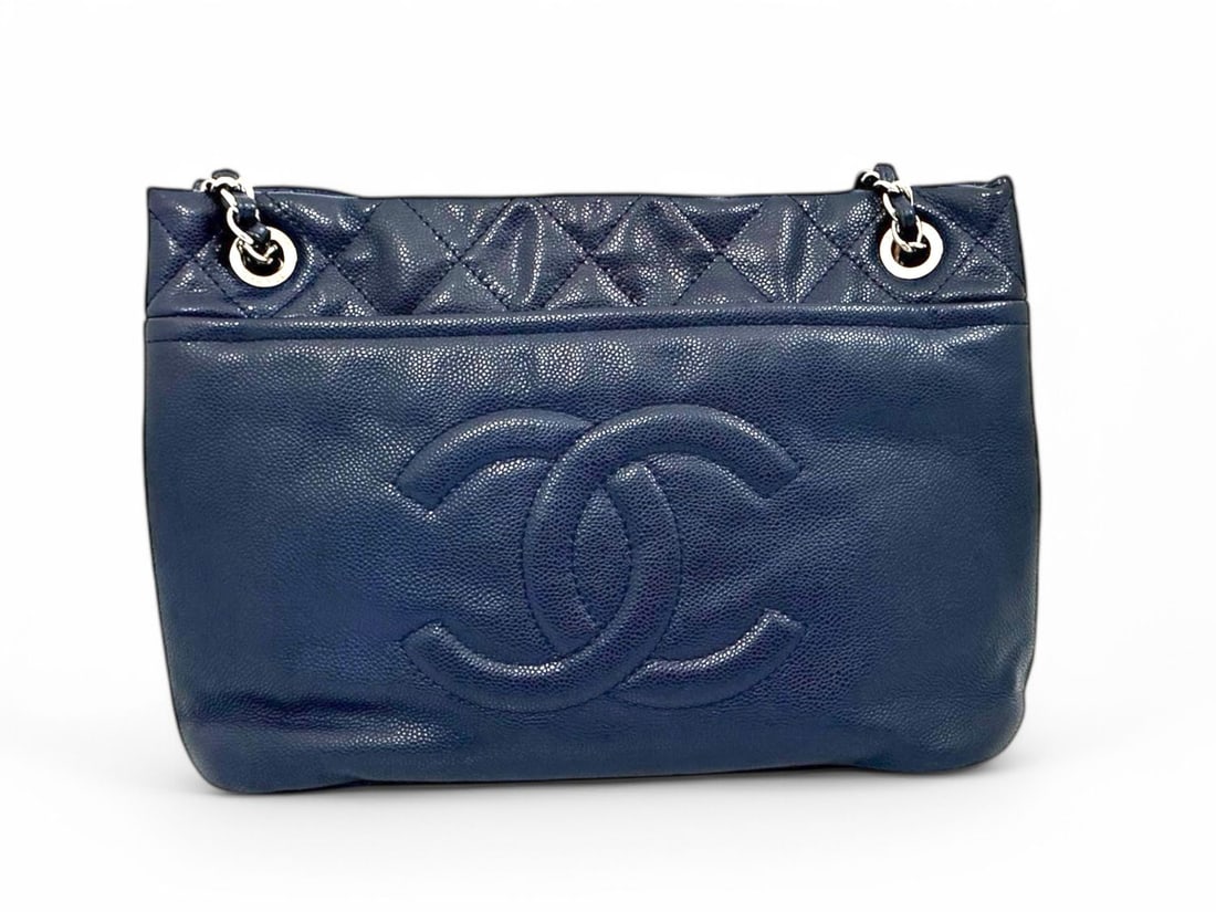 Chanel Blue Soft Leather Shopper - Opulent Masterpiece: A magnificent Chanel shopper crafted from exceptionally supple leather in a deep, sophisticated blue hue. Featuring polished silver hardware and a fluid, generous silhouette, it embodies the Maison?s 